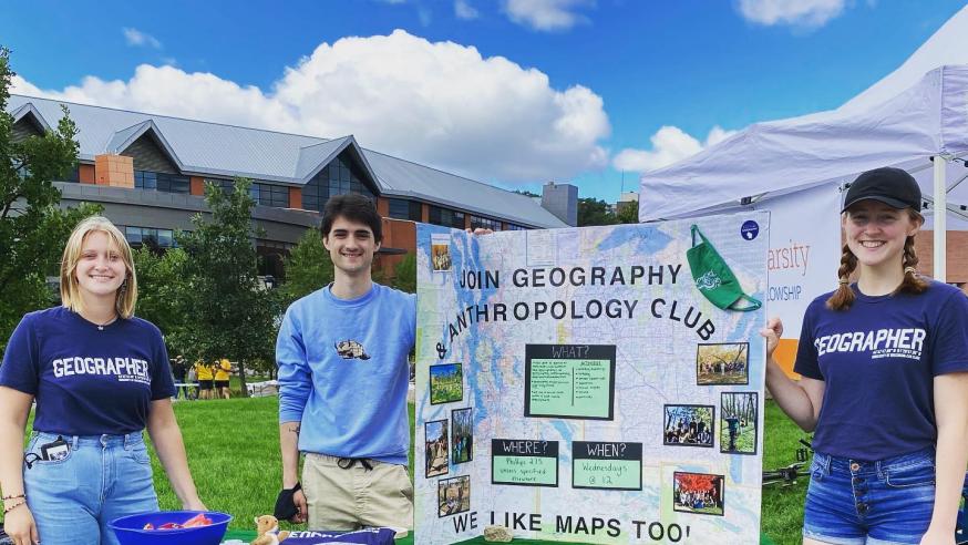 students at a table for the Geography and Anthropology Club