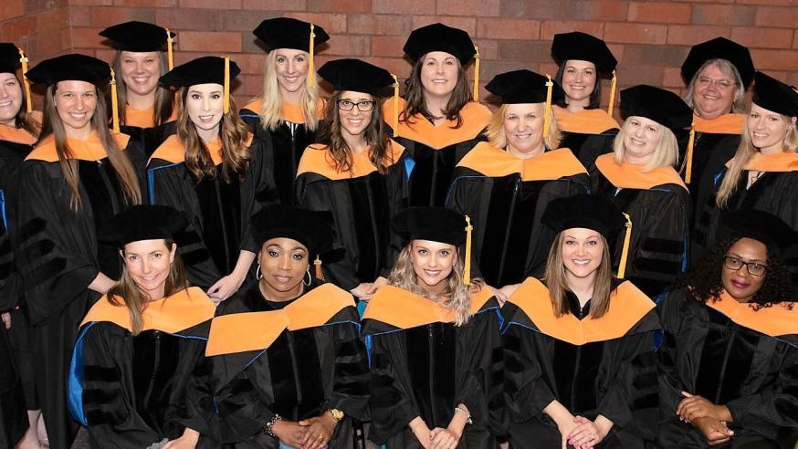 2019 DNP graduates in gowns and hoods