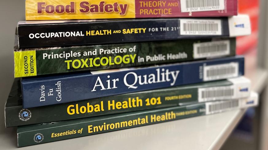 Stack of books on environmental topics 