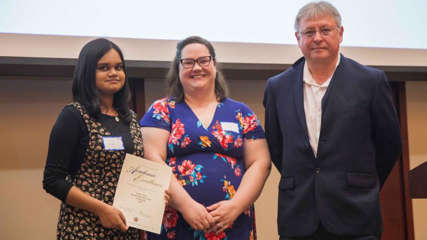 Scholarship Winner with Faculty Member and Donor