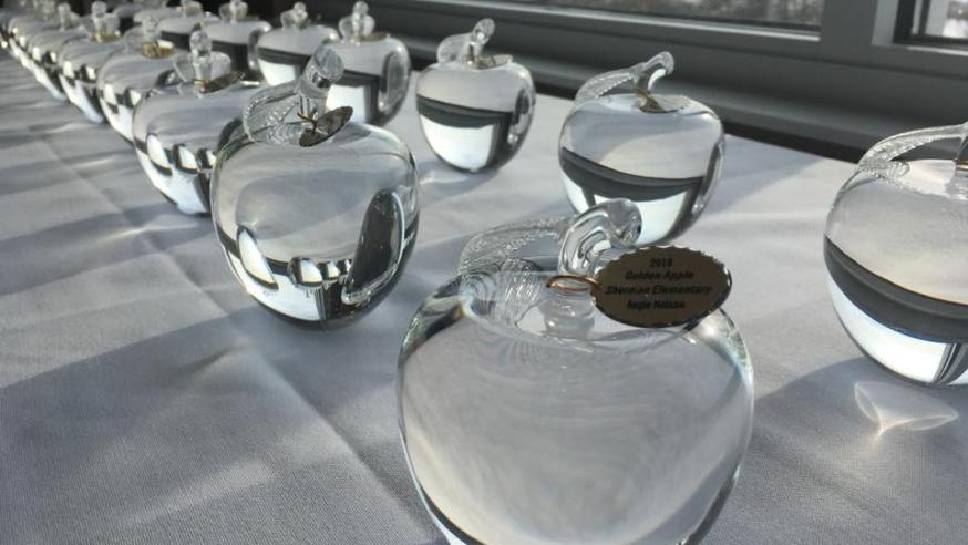 crystal apples on a white table