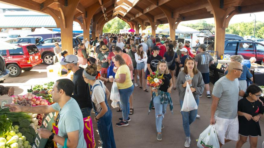 A UW-Eau Claire research team is working with the Eau Claire Downtown Farmers Market on a program that helps community members who are food insecure. (Photo by Shane Opatz)