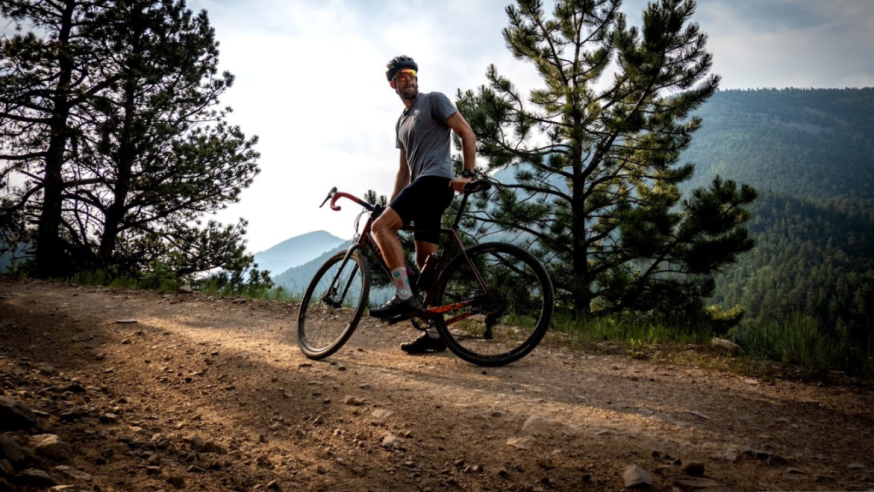 man on a bike on a mountain trail