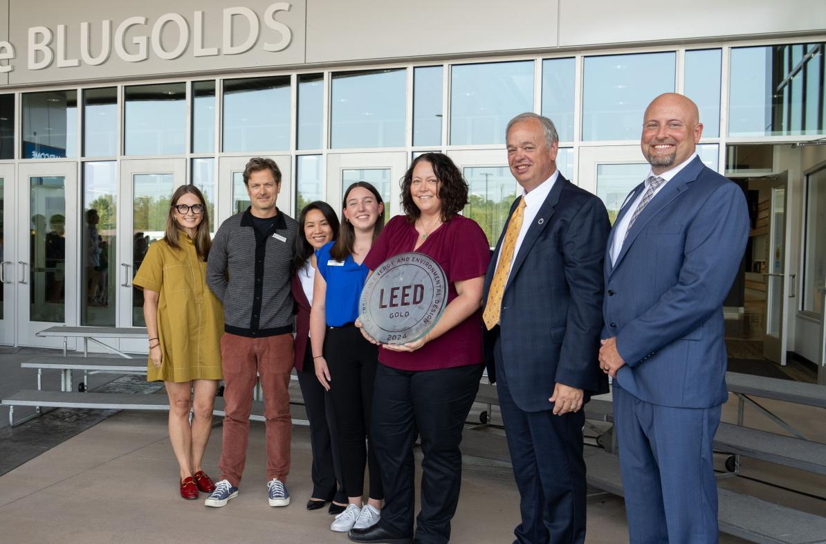 Group photo in front of Sonnentag with LEED sign