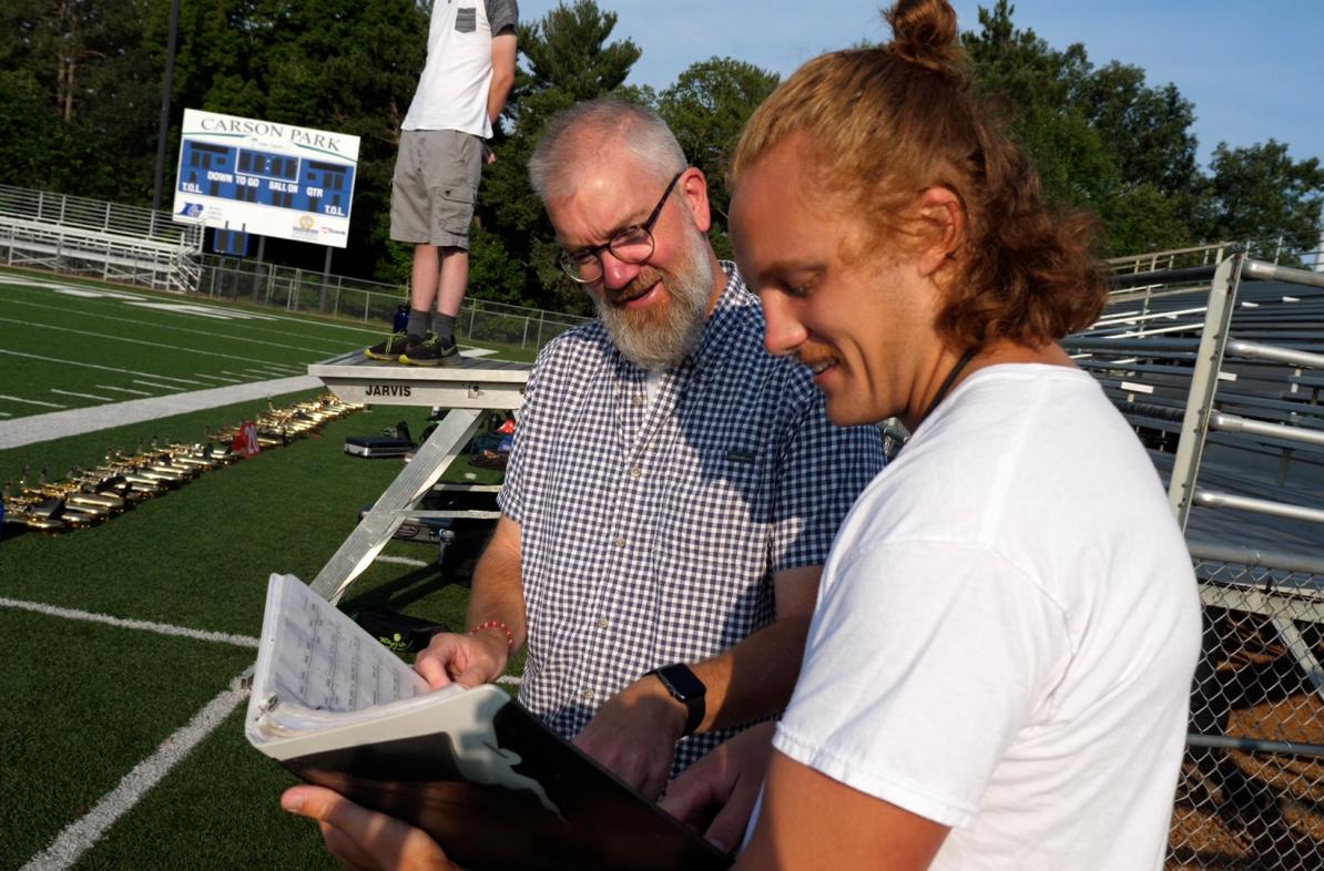 Music professor Dr. Jeff Crowell (left) collaborated with Andrew Smits, a music education major who plays in the Blugold Marching Band, on a summer research project, “Blugold Marching Band Formation Research Project.”