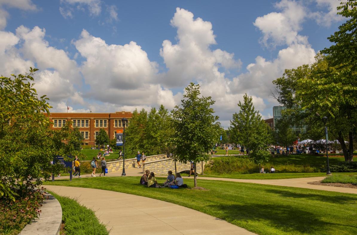 Campus mall with students in fall