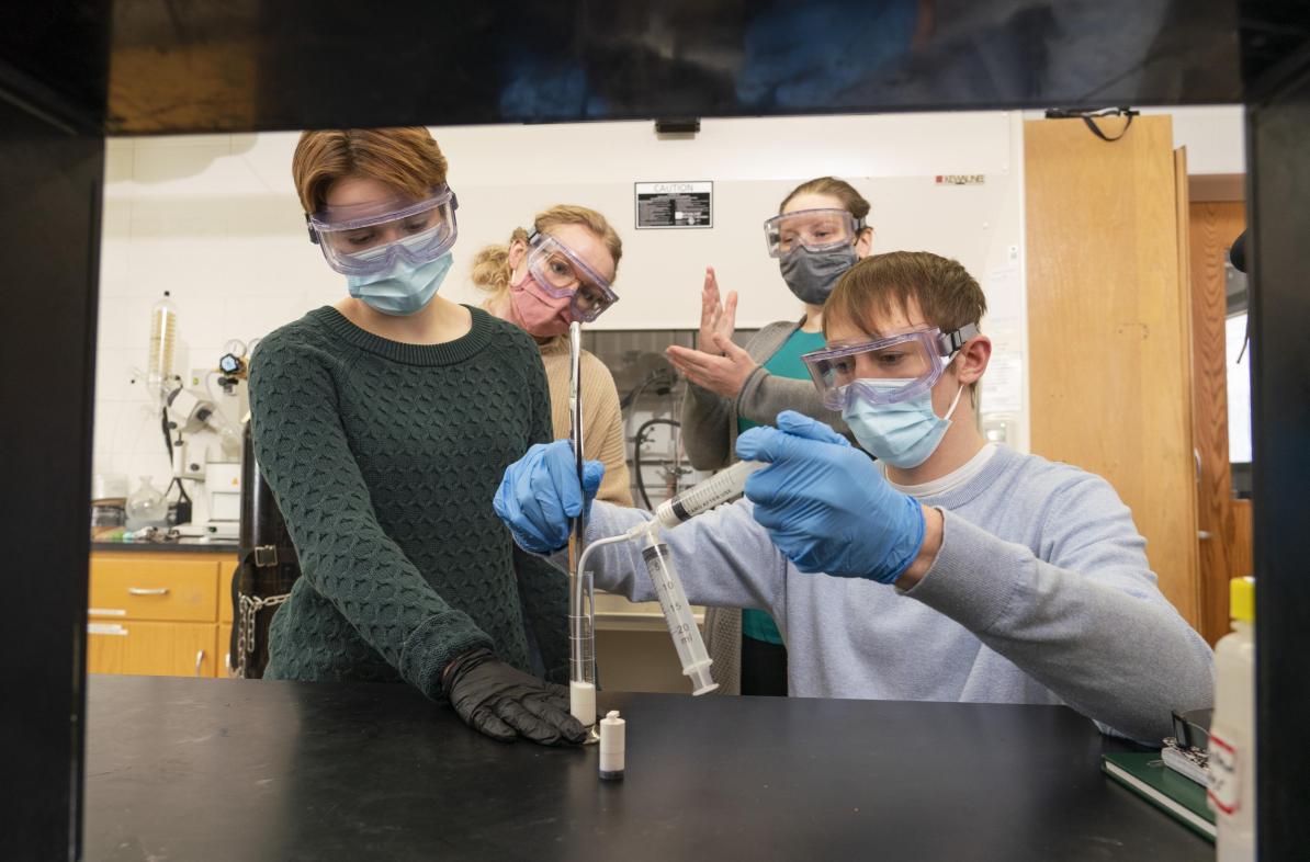 A UW-Eau Claire undergraduate research team that includes (from left) Grace Cunningham, Kira Haus, Dr. Elizabeth Glogowski and Marshall Apps will share its research with a national audience at Posters on the Hill in Washington, D.C. (Photo by Shane Opatz)