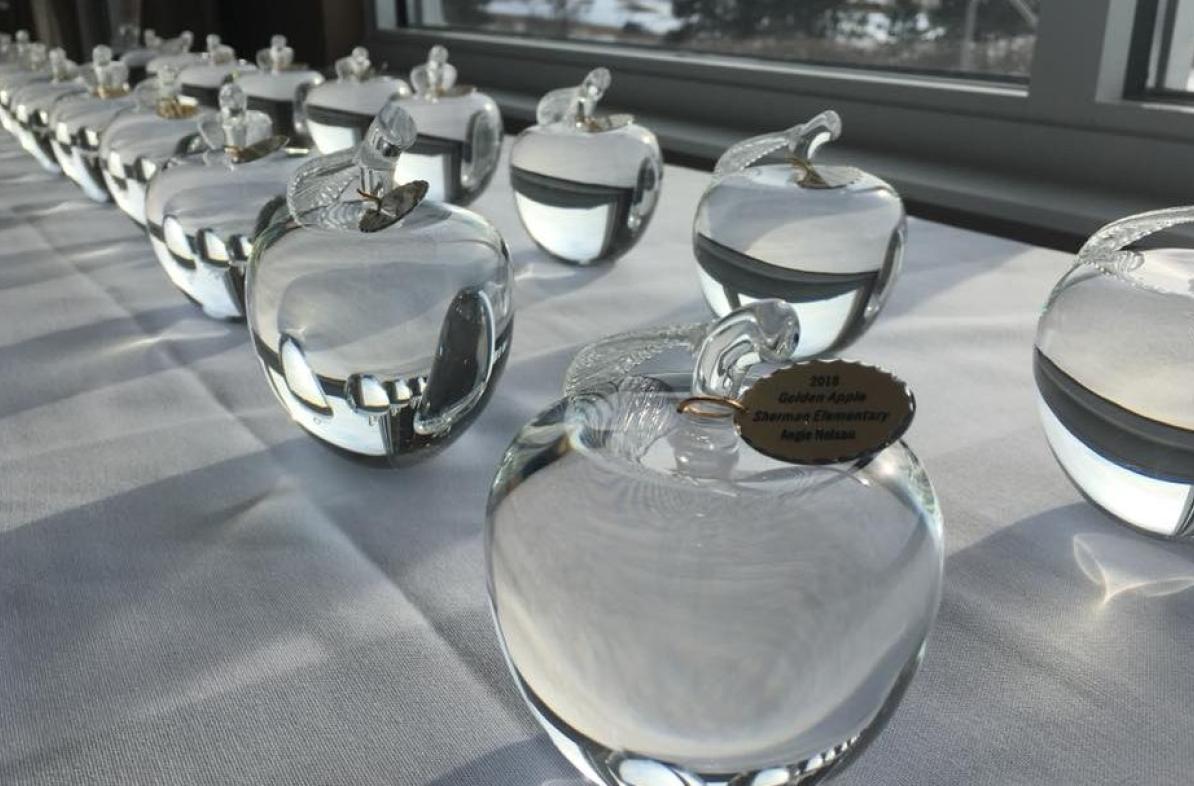 crystal apples on a white table