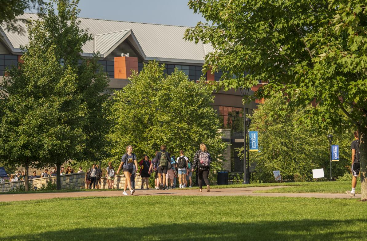 Summer campus photo with students and Davies Center