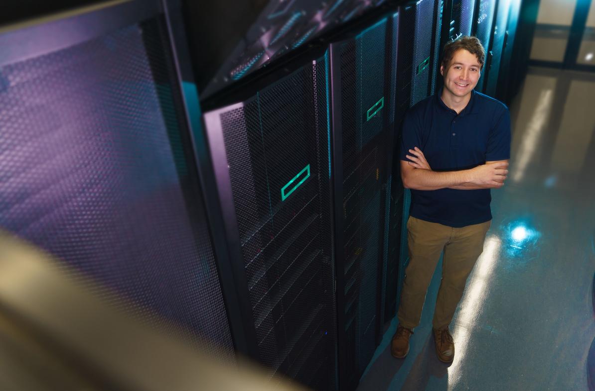 Tyler Bauer in the supercomputer cluster at CVTC