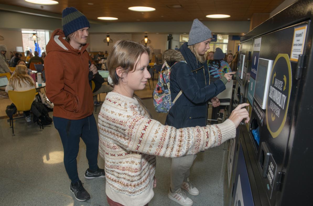 students using BluBox container machine