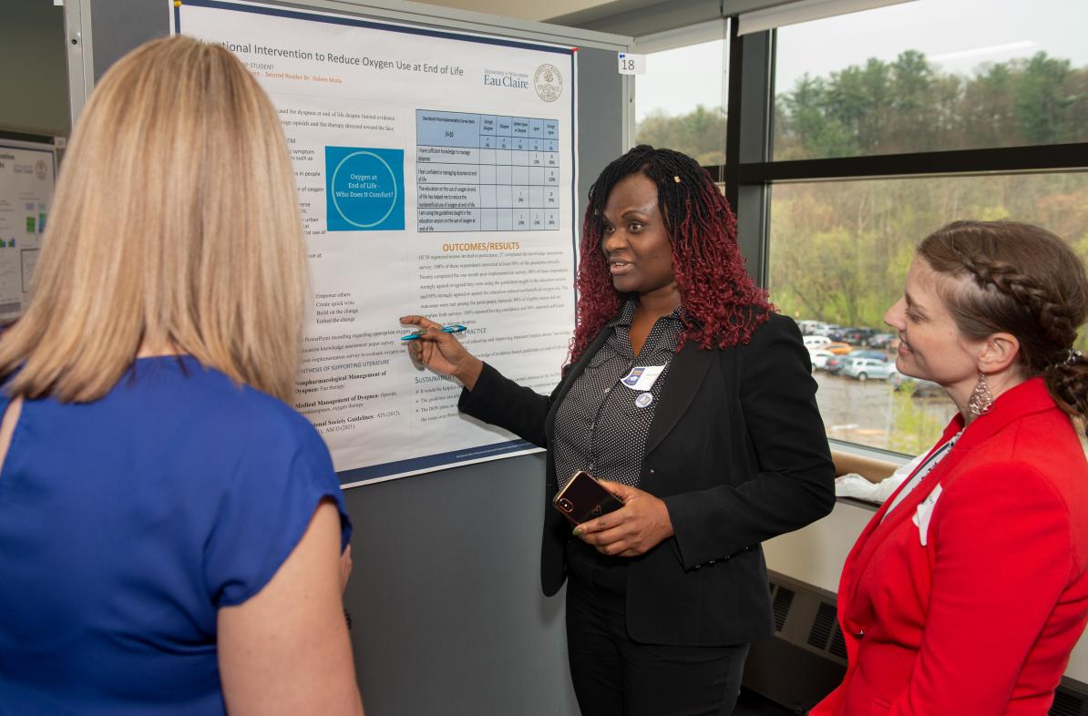 Grad student presents research poster