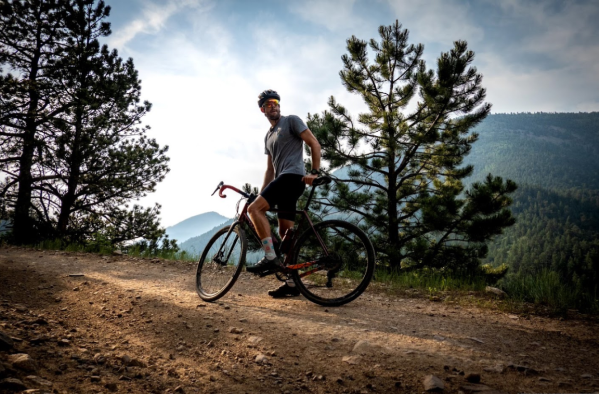 man on a bike on a mountain trail