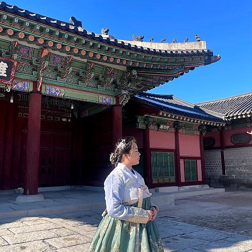 A student on a study abroad program in Seoul, Korea wearing a traditional attire